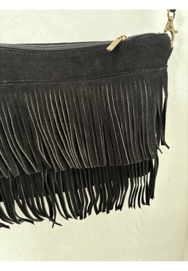 022. Bolso flecos piel