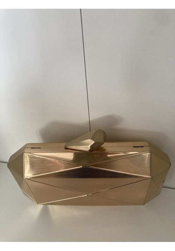 3.2. Clutch acero oro abstracto