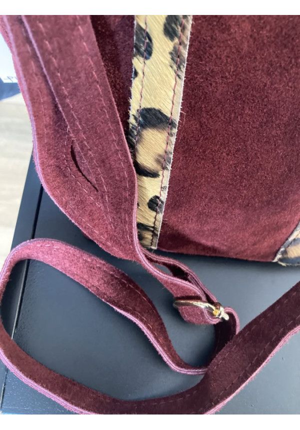 1351. Bolso piel mini asas pelo leorpardo