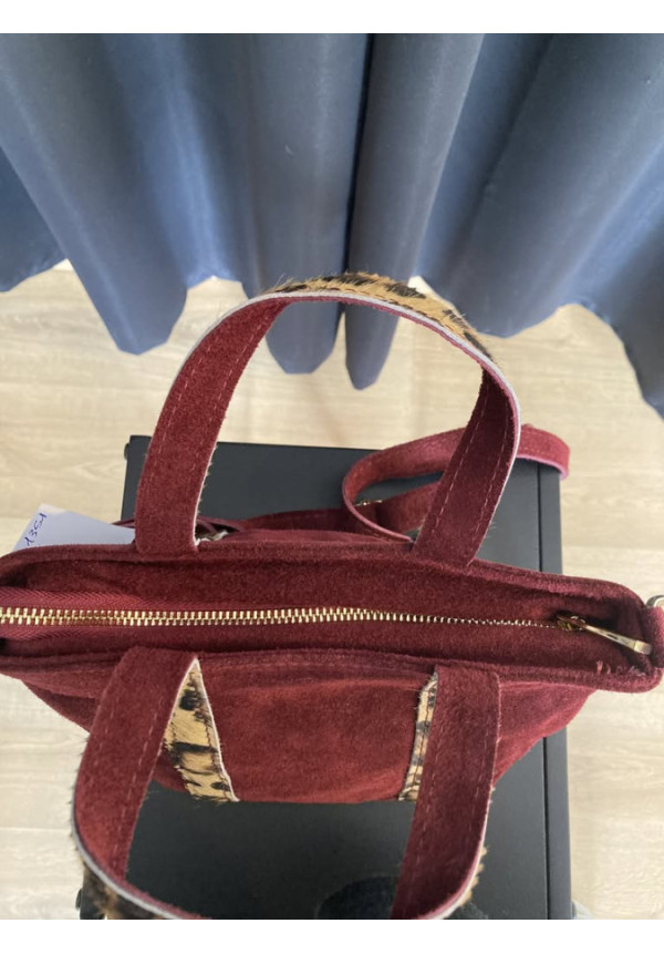 1351. Bolso piel mini asas pelo leorpardo