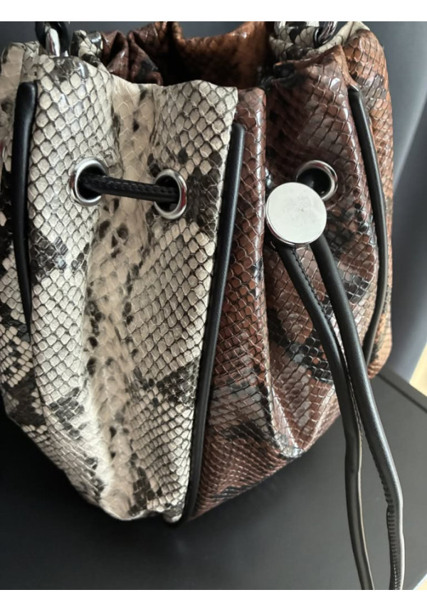025. Bolso tricolor serp