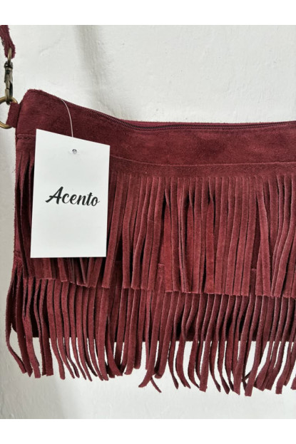 022. Bolso flecos piel