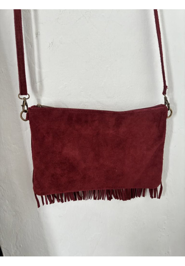 022. Bolso flecos piel