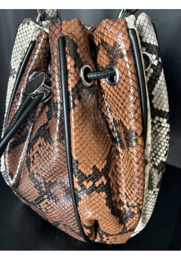 025. Bolso tricolor serp