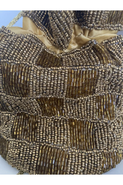 22. Saquito pedrería