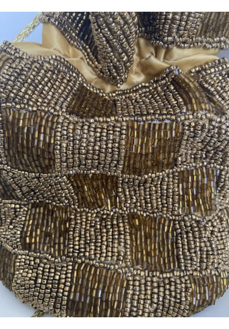 22. Saquito pedrería