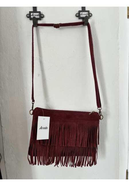 022. Bolso flecos piel