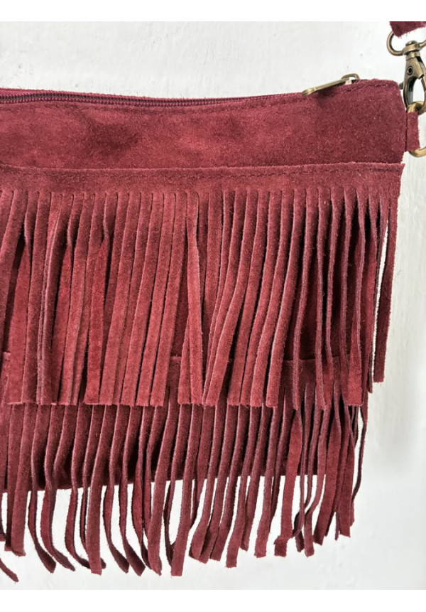 022. Bolso flecos piel