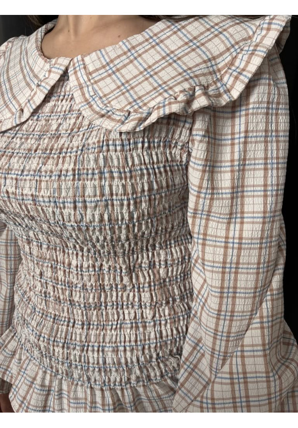 42. Blusa cuadro nido