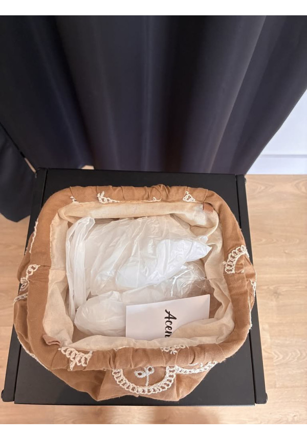 47. Bolso perforado mini