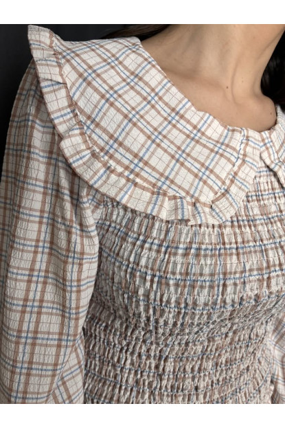 42. Blusa cuadro nido