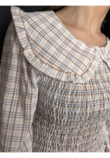 42. Blusa cuadro nido