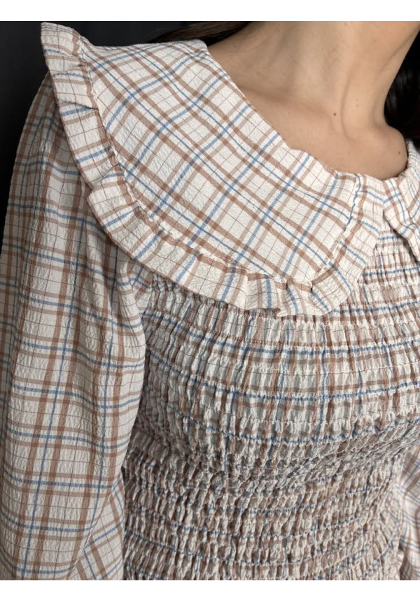 42. Blusa cuadro nido