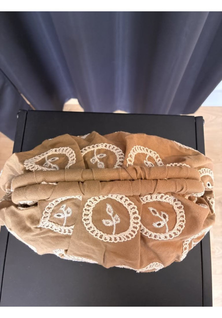 47. Bolso perforado mini