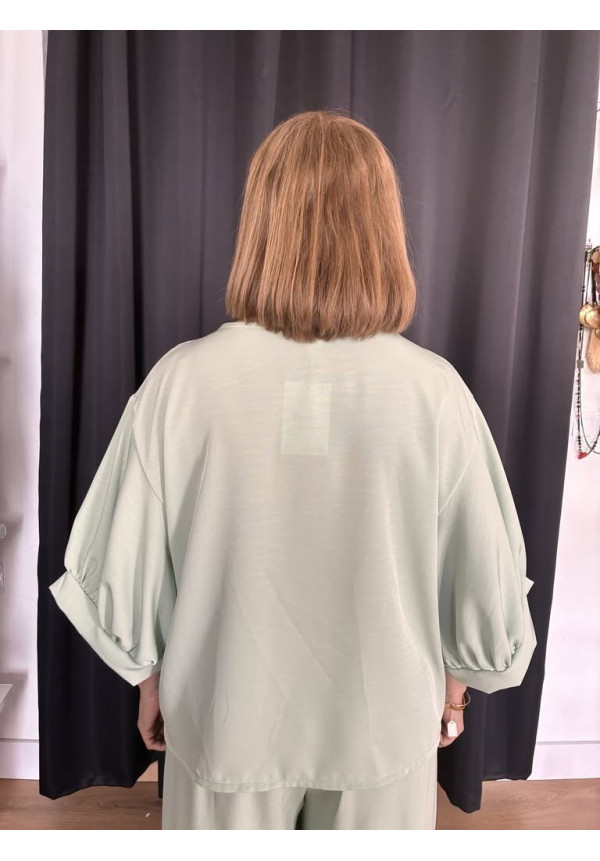 132. Blusa abullonada