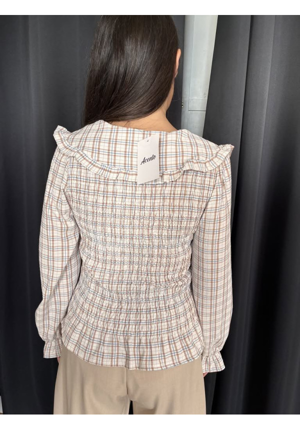 42. Blusa cuadro nido