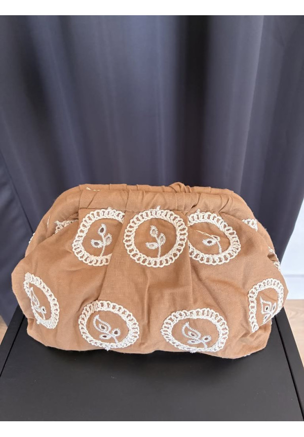 47. Bolso perforado mini